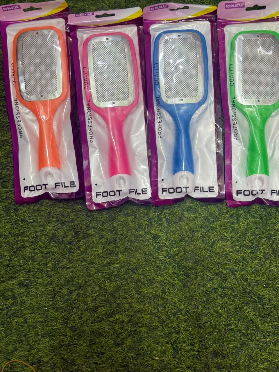 Pedicure raps color with white handle